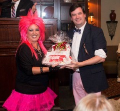 Walsh with a silent auction winner from a past Wiggin' Out Gala in Ruston, Louisiana.